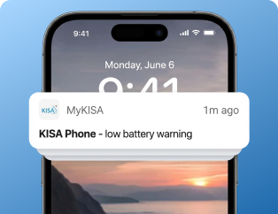 Smartphone notification displaying a 'low battery warning' from the MyKISA app for a KISA Phone