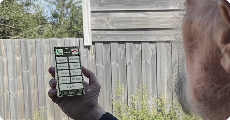 Black KISA Phone outdoors in a backyard